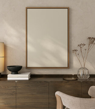 Mockup of picture frame above console with books and lamp in modern interior