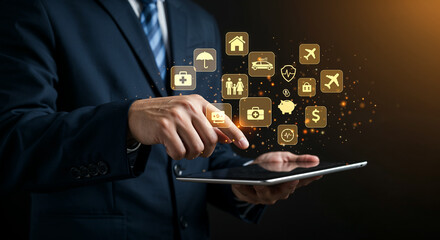 Close-up of businessman holding tablet with floating insurance icons.