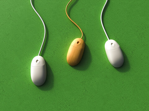 Three computer mouses including one bamboo mouse on green background