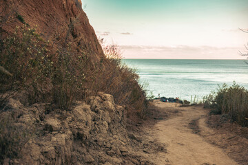 Landscape of the sea between clay mountains