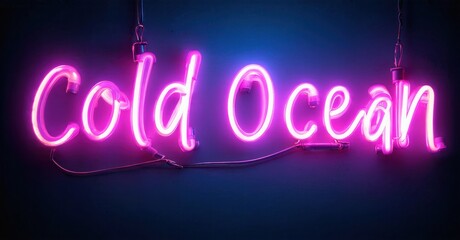 Bright pink neon sign displays words Cold Ocean. Dark background enhances glowing script. Simple, modern aesthetic.