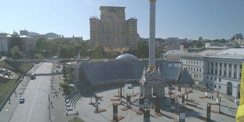 Independence square with ukrainian flag in sunbeams Kyiv Ukraine 12 may 2018