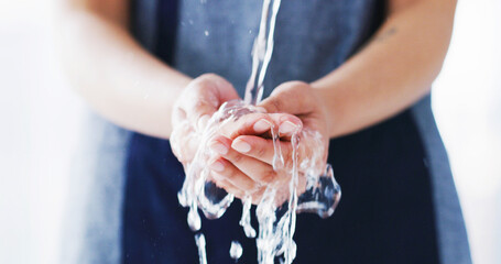 Woman, hands and cleaning with water, hygiene and bathroom for safety from bacteria. Health,...