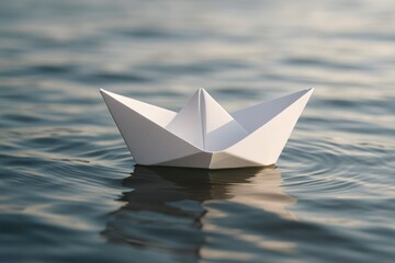 Obraz premium Paper Boat Floating on Calm Water