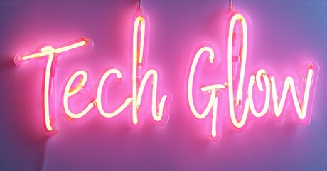 Bright pink neon sign displays Tech Glow. Script font creates modern aesthetic. Simple background emphasizes luminous text.