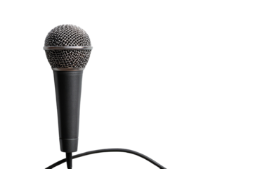 Close-up of a black microphone against a black background.  The microphone has a round, metallic grill, a smooth, black body, and a visible cord