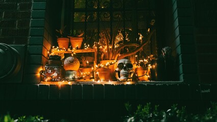 Spooky window display with skull and lights