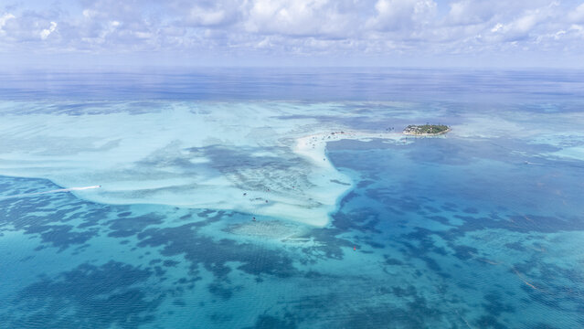 Aerial view of a tropical island paradise where turquoise waters meet the bright sky, revealing the beauty of Johnny Cay, San Andr&Atilde;&copy;s, San Andres and Providencia, Colombia.