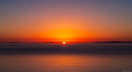 Fototapeta premium Vibrant Sunset over Calm Sea.