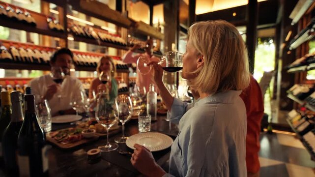 Wine tasting room: Enjoying a private wine tasting experience with friends in an elegant wine cellar setting