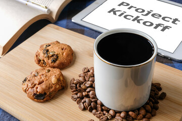 Coffee and Cookies with Project Kickoff Tablet for Startup Business