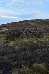 Peat Bricks Stacked in a Pile Drying