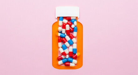 Top-Down View of Pill Bottle Silhouette Filled with Red White and Blue Capsules  
