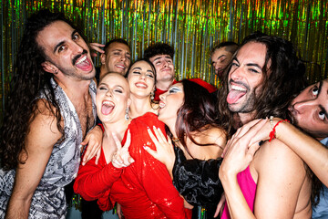 Obraz premium Friends Celebrate Pride With Playful Poses Sticking Tongues Out and Vibrant Energy at a Party