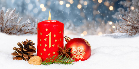 First 1st Sunday in advent with burning candle Christmas time winter panorama with copyspace copy space