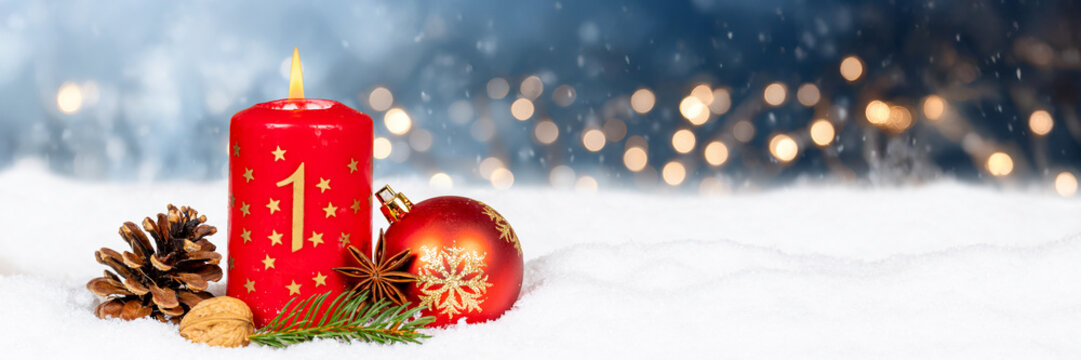 First 1st Sunday in advent with burning candle panorama Christmas time winter with copyspace copy space