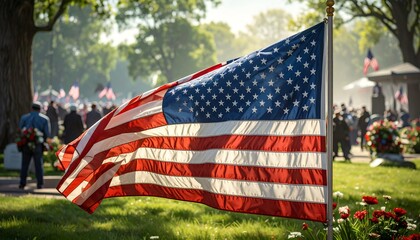 American flag waving in a cemetery