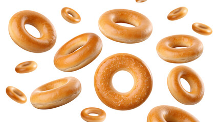 Assorted bagels floating in the air isolated on transparent background