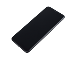 A modern smartphone with a glare of light on a transparent background