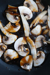Close-Up of Mushrooms Cooking in a Pan