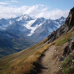 Ridge trail leading into wilderness beneath snowy Alaska Range