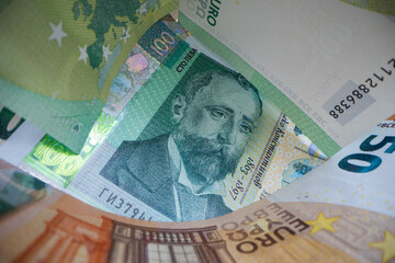 Bulgarian leva with euro banknotes as a background.
