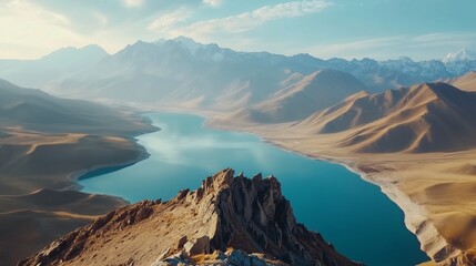 Person standing on mountain top with a lake in the background. Arashan asia central video of the summit of lake. Panorama of the field with a shallow elevation. An lifestyle individual positioned.
