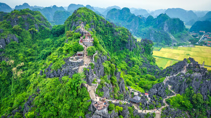 Lying Dragon mountain viewpoint, Stunning view of Tam Coc area with mountain range, rice fields. It is such as Great Wall in Ninh Binh, Vietnam