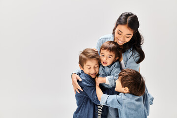 Cherishing sweet moments as a young mother plays with her joyful boys indoors
