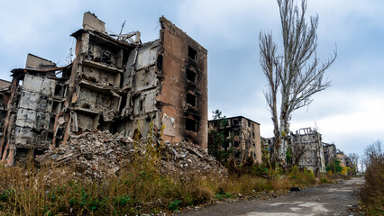ruined street and destroyed houses the city Kiev war in Ukraine