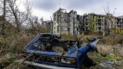 ruined street and destroyed houses the city Kiev war in Ukraine