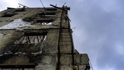 ruined street and destroyed houses the city Kiev war in Ukraine