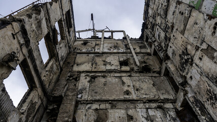 ruined street and destroyed houses the city Kiev war in Ukraine