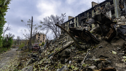ruined street and destroyed houses the city Kiev war in Ukraine