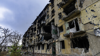 ruined street and destroyed houses the city Kiev war in Ukraine