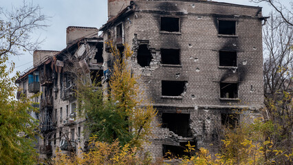 ruined street and destroyed houses the city Kiev war in Ukraine