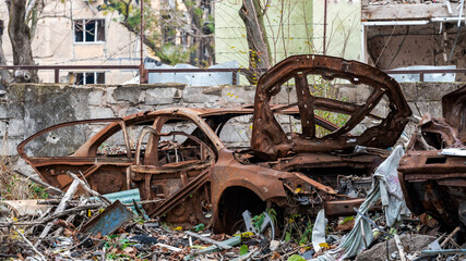 ruined street and destroyed houses the city Kiev war in Ukraine