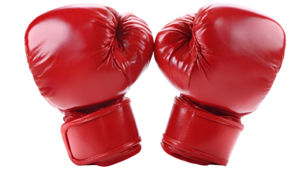 Pair of vibrant red boxing gloves ready for a match showcasing strength and determination in sports arena