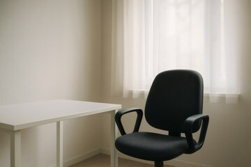 Comfortable black office chair placed near white table in bright room with window and sheer curtains, creating peaceful workspace