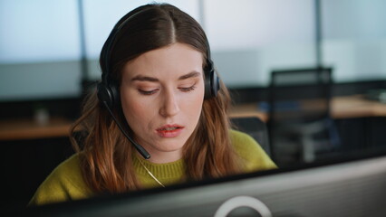 Telemarketing manager consulting call center closeup. Woman talking headset
