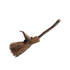 Obraz premium Whimsical Miniature Witch's Broom with Pointed Hat on Black