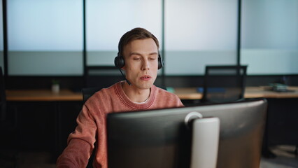Technical support talk client in office. Man analyzing customer request hotline