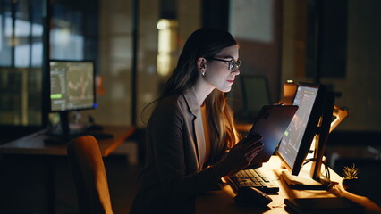 Nighttime investor analyzing blockchain using touchscreen in workspace closeup