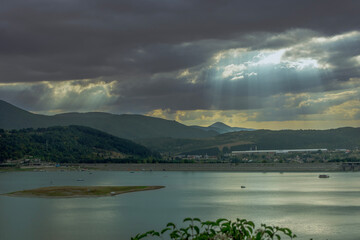 Sun rays find their way through clouds 