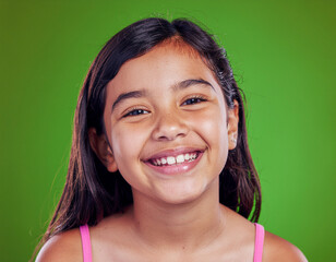 portrait of a smiling young girl on green screen background
