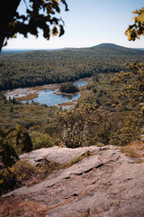 A view from the Wapack Trail. This photo is taken from Pratt Mountain, looking over Binney Pond in the foreground and Mount Watatic in the background. Late summer in southern New Hampshire.
