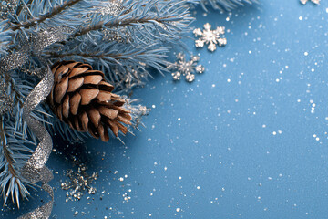 Winter Pinecone and Snowflake Decoration. Blue winter decor with pinecone and snowflakes, ideal for Christmas and New Year designs.