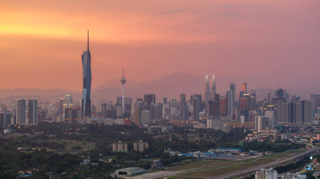 Aerial beautiful sunset dusk at Kuala Lumpur city skyline.
