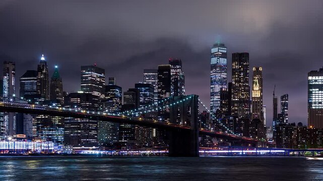 Brooklyn Bridge and Lower Manhattan at Night with Boat Traffic Timelapse