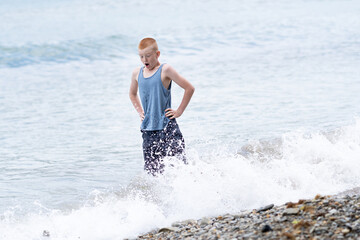 portrait of a teenager on the seashore or ocean